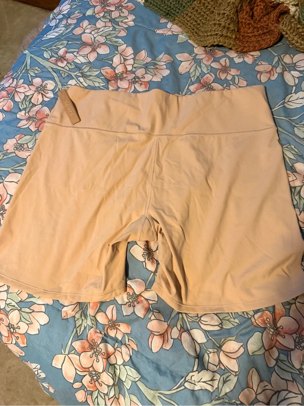 SKIMS High-Rise Biker Shorts in Light Nude